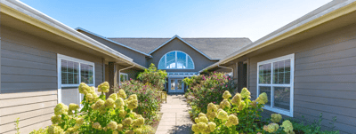Pathway leading to the main entrance of Evergreen Senior Living