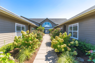 Pathway leading to the entrance of a senior living facility