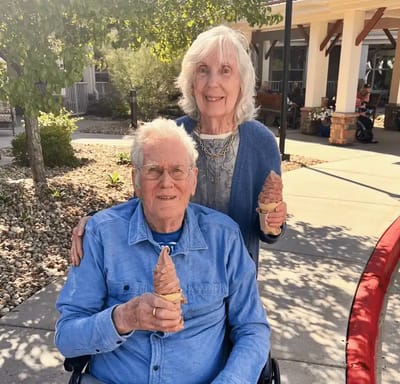 Two residents enjoying ice cream in the garden