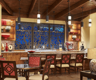 Cozy common area with a bar and decorative lighting