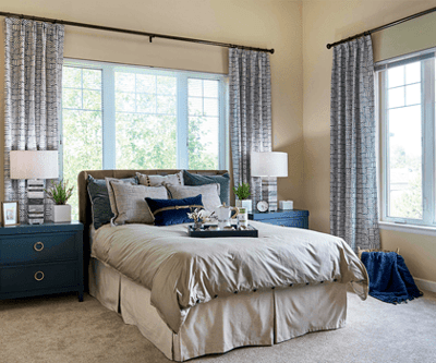 A well-decorated private resident room with natural light