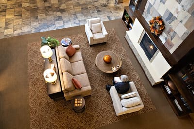 Cozy lobby area with a resident reading