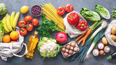 An assortment of fresh vegetables and fruits on a table