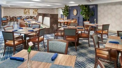 Stylish dining room with tables and chairs