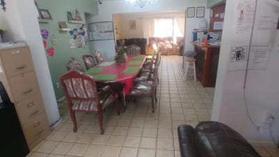 Common area with dining table and chairs