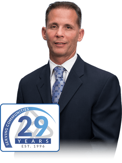 Always Best Care Of Central Ohio, nursing home in Westerville, OH — Professional man in a suit with a milestone logo