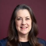Always Best Care Of Central Ohio, nursing home in Westerville, OH — Professional woman smiling against a solid background