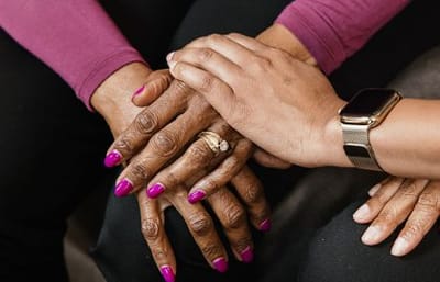 Always Best Care Of Central Ohio, nursing home in Westerville, OH — Two pairs of hands with manicured nails resting together