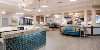 Bright lobby area with seating and information desk