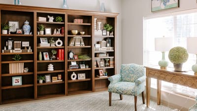 Cozy interior space with bookshelves and decorative elements