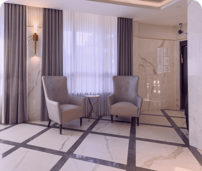 A stylish common area with seating and natural light.