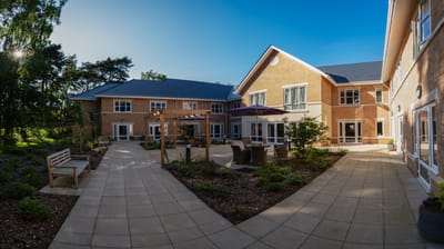 Patio area of a senior living facility with seating