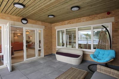 Cozy common area with seating and open doors