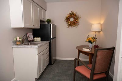 Cozy kitchen area with a dining table and chair