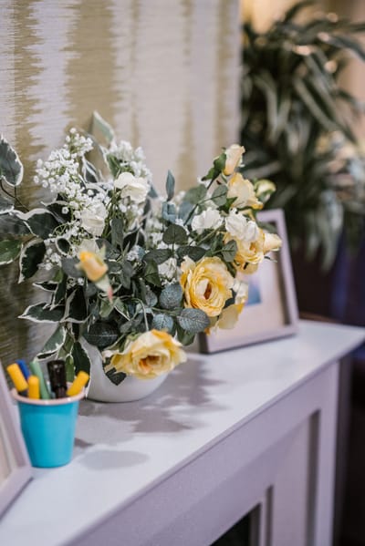Decorative flower arrangement on a mantel