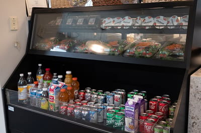 Display of beverages and salads in a facility's food area