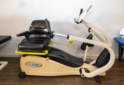 A Nustep exercise machine in a facility setting
