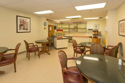 Interior common area with tables and chairs