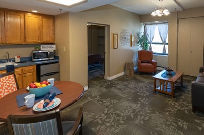 Cozy interior view of a resident room with furniture