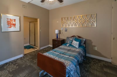 Cozy private room with bed and decor