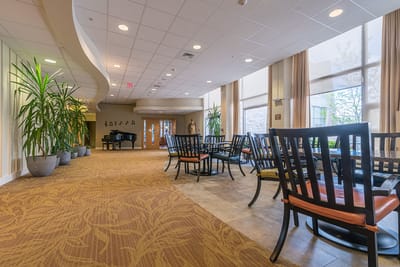 Bright common area with seating and plants
