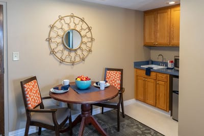 Cozy dining area with a round table and chairs