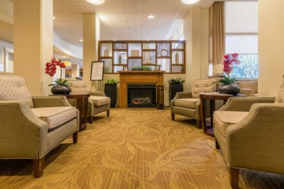 Cozy common area with comfortable seating and a fireplace
