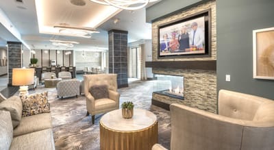 Interior common area with seating and residents