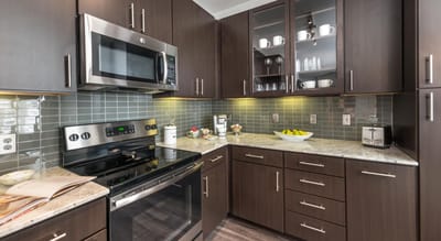 Interior kitchen space with modern appliances and decor