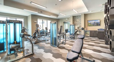 Interior view of a fitness center with exercise equipment