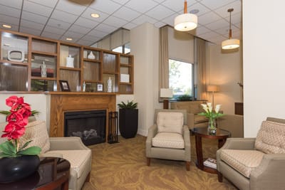 Interior of a cozy common area with seating and decor