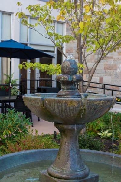 Beautiful outdoor fountain in a landscaped area