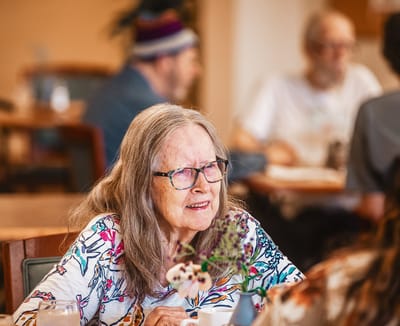 Resident enjoying conversation in a common area