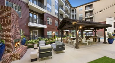 Outdoor patio area with seating and dining options