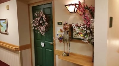 Decorated door of a resident's room with flowers
