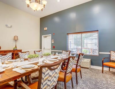 Dining area with a large table and chairs