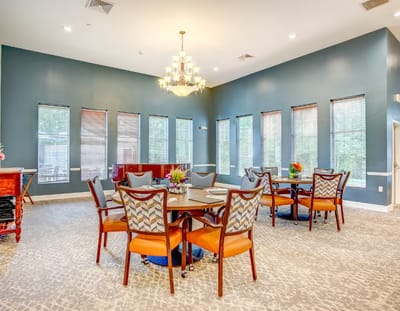 Bright common area with tables and chairs