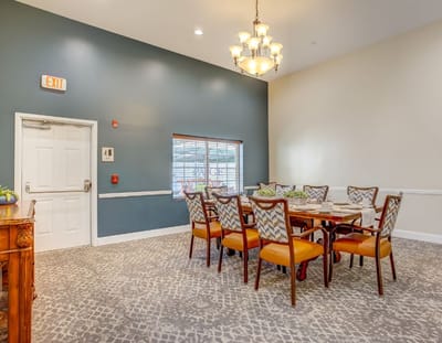 Bright dining room with a large table and chairs