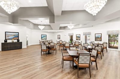 Bright dining room with tables and chairs