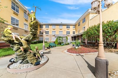 Outdoor garden area with decorative sculpture