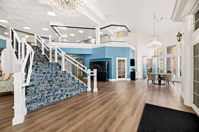 Bright and welcoming lobby area with staircase