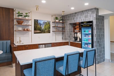 Modern common area with seating and refreshments
