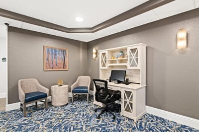 Cozy interior workspace with desk and seating