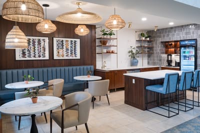 Interior of a cozy common area with seating and decor