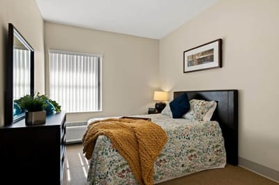 Cozy resident room with a bed and decor