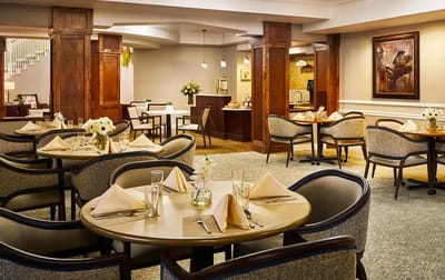 Elegant dining room setup with tables and decor