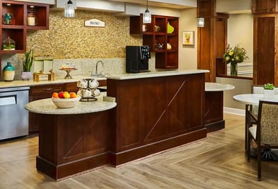 Chef's kitchen area with counter and seating