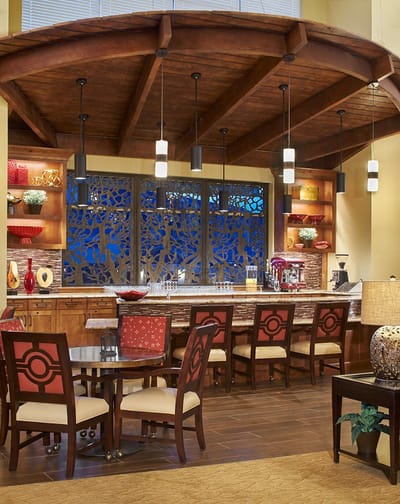 Interior view of a stylish dining area with bar seating