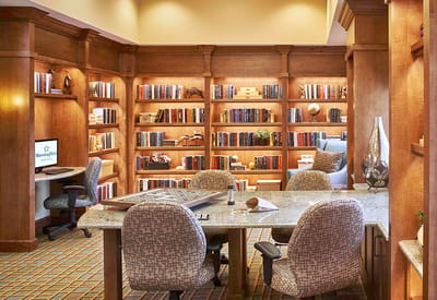 Interior view of a cozy library room with bookshelves