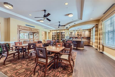 Interior view of a dining area with tables and chairs